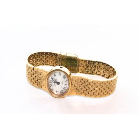 Vintage Accessories - Vintage Rhapsody Womens Watch Textured Liquid Gold Tone Band Not Working